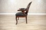 Zabytkowy fotel mahoniowy z końca XIX wieku
