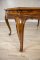 Neorokokowy stół z drewna orzechowego