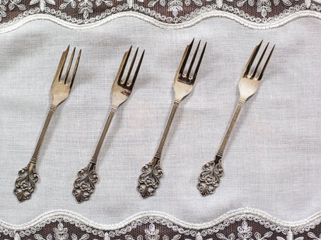 Four Silver Dessert Forks