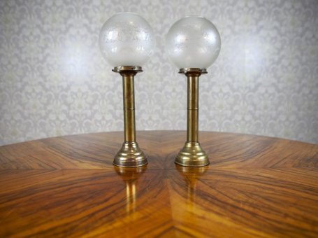 Two Candlesticks with Glass Shades